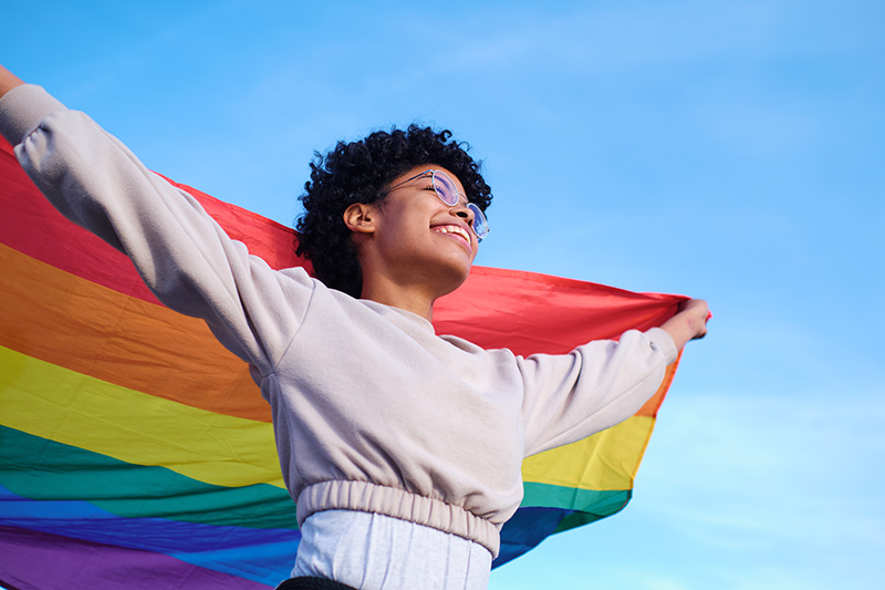 woman with Pride flag